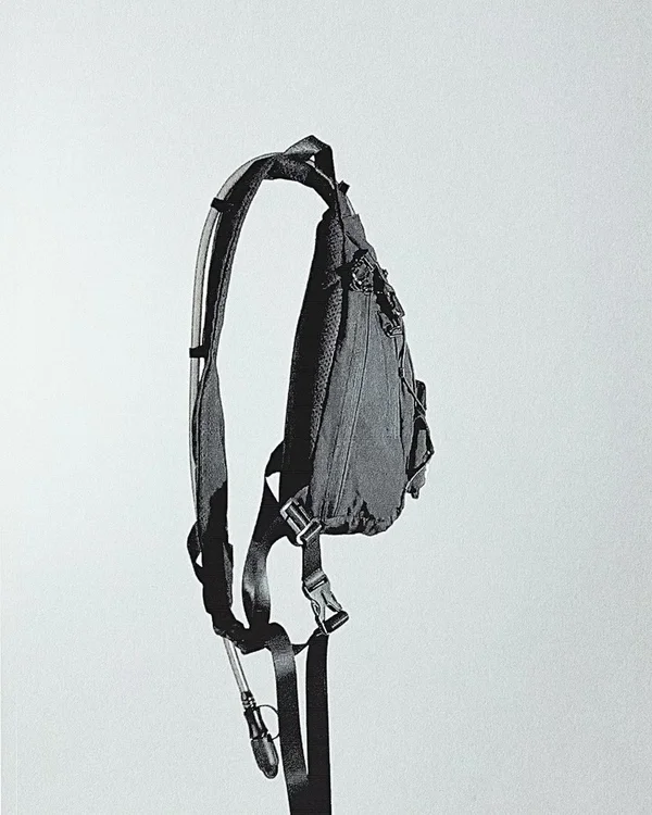 “VECTOR” HYDRO-SLING BAG
FRIDAY, SEPT 05 @ 1:00PM PST. 

SIGN-UP FOR OUR EMAIL / SMS LIST ON OUR WEBSITE 
FOR 24 HOURS EARLY-ACCESS! 
Link In Bio. 

Six months, endless fabric searching, and two samples later.. I’m finally ready to show you what I’ve been making!! This is our latest addition to the technical accessories lineup, and honestly, it’s become my daily carry for everything: EDM festivals, night outs, hiking, and general day-to-day operations.

BAG DIMENSIONS: 13.5” × 8” × 4” — compact enough to meet most festival regulations (unless security’s having a bad day).

CORE FEATURES:
- 3 Holster Modes: Flow / Lock / Grip
- Dual bladder system: 2L and 1L options.
- Anti-theft YKK hardware + VELCRO® top fastener (not visible on this pre-release)
- Main compartment: dedicated bladder pocket, mesh security pocket, keychain loop
- Secondary zipper compartment
- 2 VELCRO® tertiary pockets (one removable for strict festival compliance)
- Super Soft Mesh Fabric Backing (yes, you can go shirtless while wearing this)

TECHNICAL SPECS:
- Fully removeable hydration system — wear it as a standard bag when needed.
- Multiple body attachment points for hiking/running stability.
- VELCRO® patch panel for custom patches.
- LED-ready design (remove drawstring adjusters for light mounting)

Honestly this was a headache to make HAHA. Picking the proper materials, sizing and compliance was everything. I hope to see you all rocking this one! 

Would you guys cop? Lmk down in the comments and I will choose 2 people to get this for free on release!